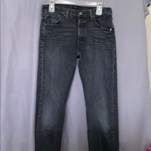 Men’s black, button fly faded jeans. Size 32x34